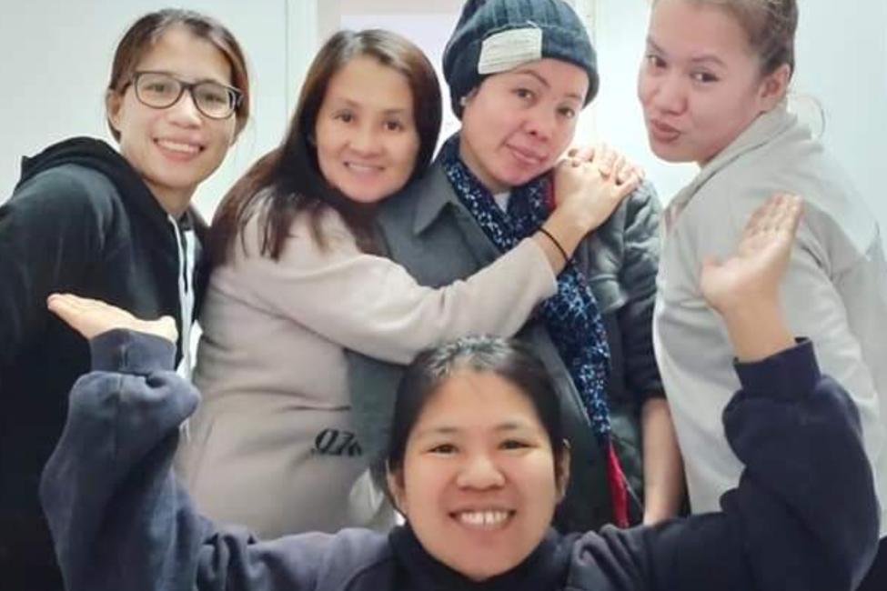 Angilyn(3rd from left) with other domestic workers in the shelter. Photo: HELP for Domestic Workers